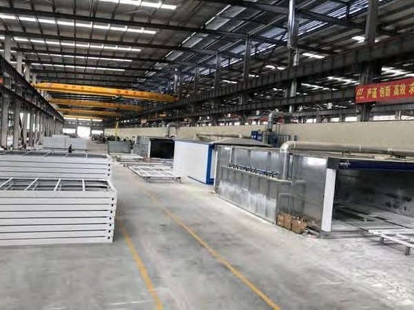 Surface coating line at Wanbang modular housing factory — corrosion protection for container houses